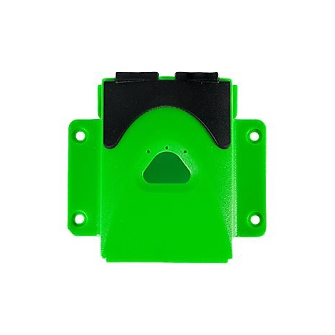 Grüner Kunststoffblock mit schwarzen Elementen und Löchern. Detailaufnahme.