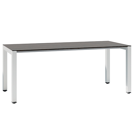 A rectangular table with a black tabletop and silver legs. The table stands against a white background.
