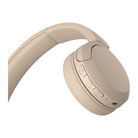 Beige Kopfhörer, Detailansicht mit Knöpfen, USB-C Anschluss.