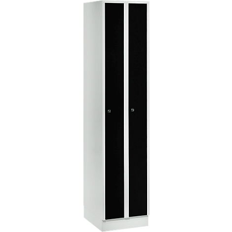 A white cabinet with two black doors, each with a handle.