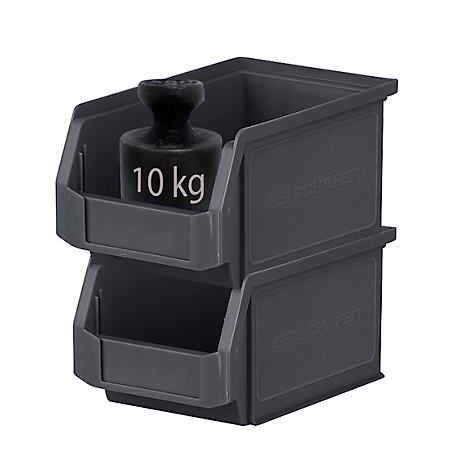Deux boîtes empilables grises avec un poids noir de 10 kg dans le compartiment supérieur.