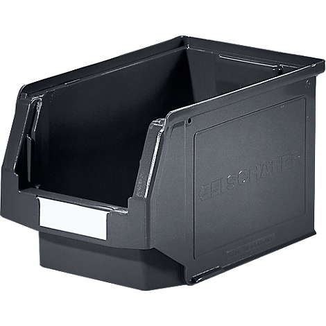 Boîte en plastique grise et ouverte. "SCHALLER" est visible sur le côté, avec une surface blanche en dessous.