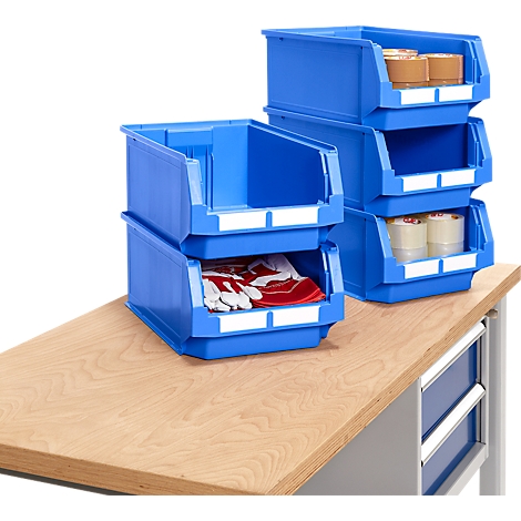 Blue plastic bins on a workbench; filled with gloves, rolls of paper and tape.