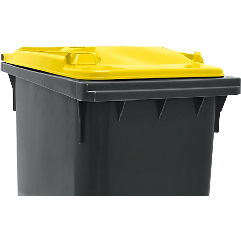 Poubelle grise avec couvercle jaune, gros plan.