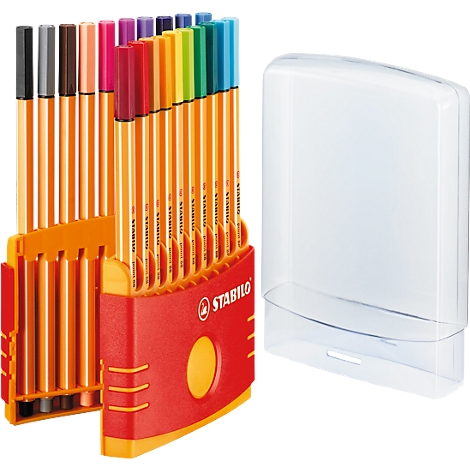Ein Set bunter Filzstifte in orangefarbener Halterung. Daneben eine transparente Kunststoffbox.