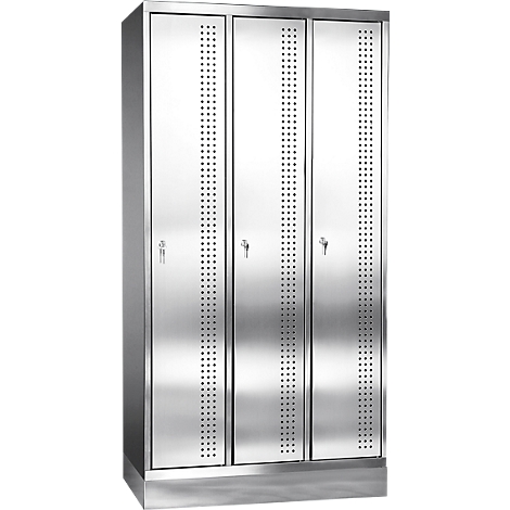 Three-part metal cabinet. The doors have hole patterns, with keys and handles.