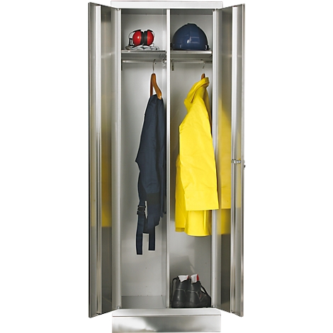 Cabinet with work clothes: helmet, hearing protection, jackets, boots.