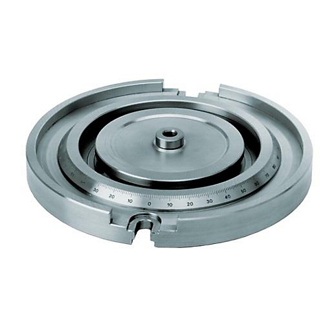 Een metalen ronde tafel met een gradenschaal en een verhoogde centrale plaat.