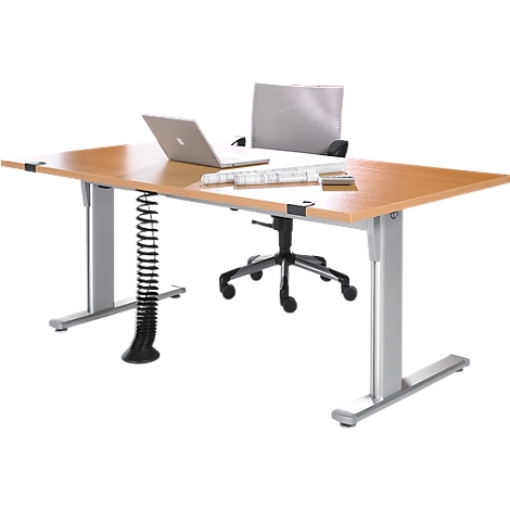 Desk with laptop, chair and a spring.