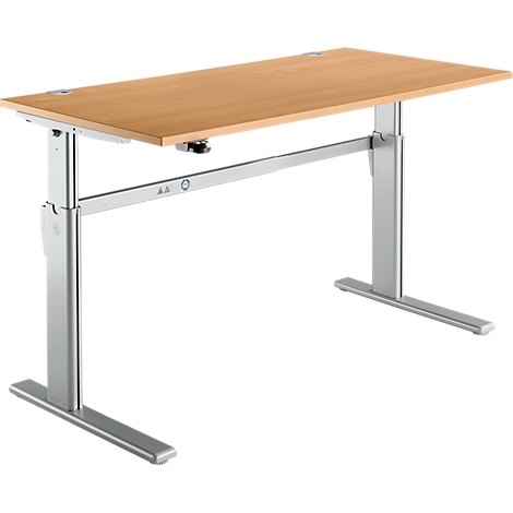A height-adjustable desk with a light brown tabletop and silver legs, on a white background.
