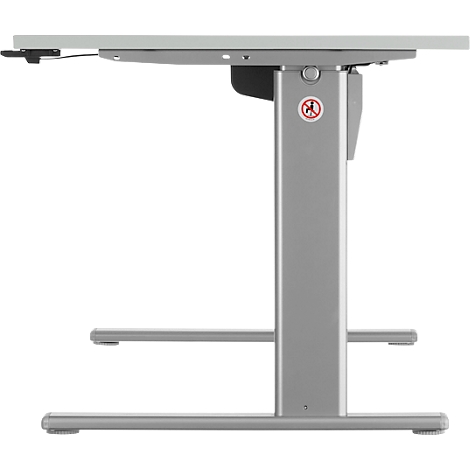 A silver height-adjustable desk. The desk frame has a rectangular base and a column. The table top is light gray.