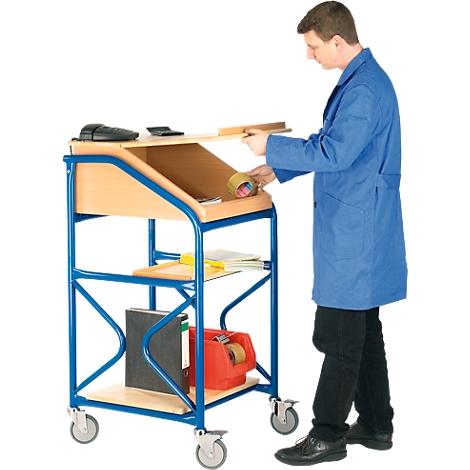 Man operates a blue, rolling tool cart with paper, tape and folders.