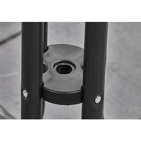 Detail shot: Black metal bars with screws, connected by a round holder.