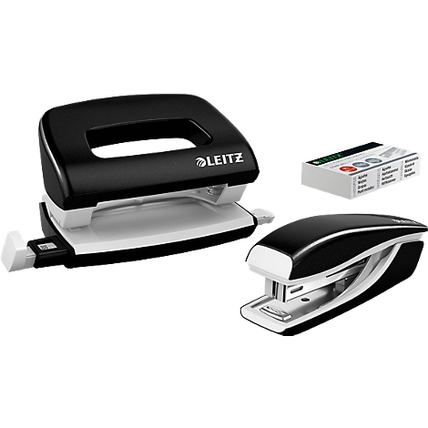 Black Leitz hole punch and stapler. Also a box of staples.