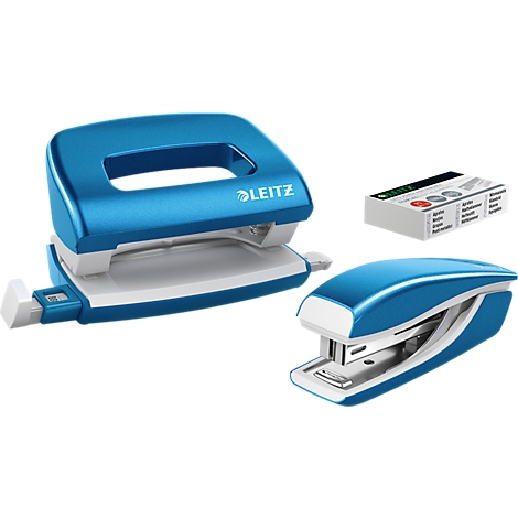 Blue hole punch, stapler and staples. The writing LEITZ is visible on the hole punch.