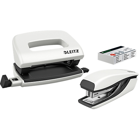 White hole punch, stapler and staples box with black element. The products are from Leitz.