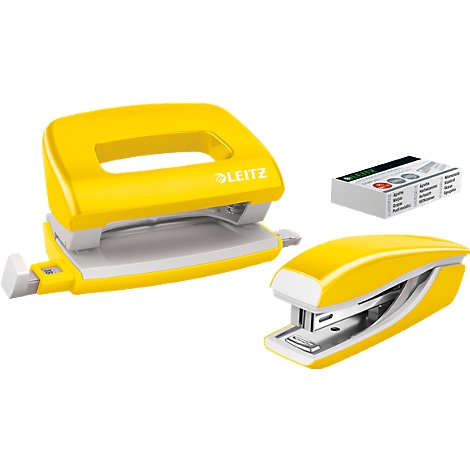 Yellow Leitz staplers, hole punch and stapler on white background.