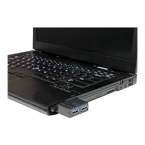 Gros plan d'un ordinateur portable noir avec un hub USB. Clavier, ports et écran visibles. Sur fond blanc.