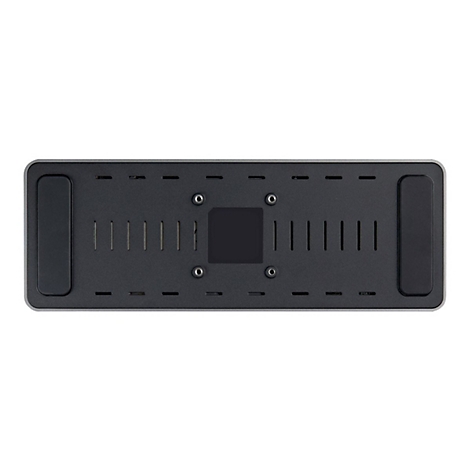 Appareil rectangulaire noir-gris, nombreux trous et vis, coussinets en caoutchouc aux extrÃ©mitÃ©s.