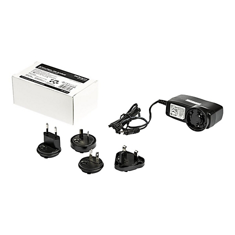 Netzteil und verschiedene Adapterstecker auf weiÃŸem Hintergrund.
