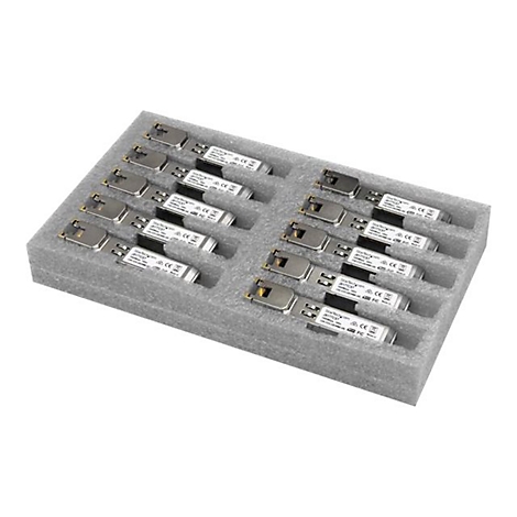 Un insert en mousse grise avec des renfoncements rectangulaires contenant des rangées de petits composants électroniques rectangulaires argentés et blancs.