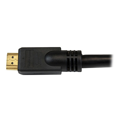 Nahaufnahme eines schwarzen HDMI-Kabels. Der Stecker ist rechteckig und goldfarben, das Kabel ist dick.