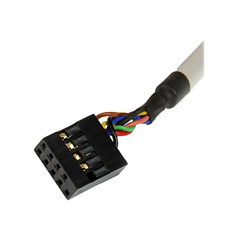 Nahaufnahme eines schwarzen Steckers mit farbigen Kabeln. Goldene Kontakte sind sichtbar. Der Stecker ist schräg platziert.