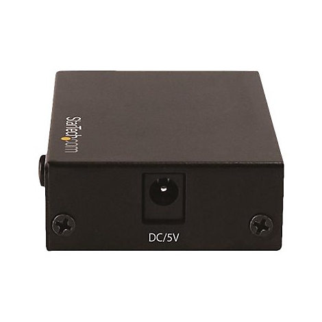 Ein schwarzes, rechteckiges elektronisches Gerät. Auf der Vorderseite befindet sich ein DC/5V-Anschluss und ein Schraubenkopf. Der Schriftzug Startech.com ist zu sehen.