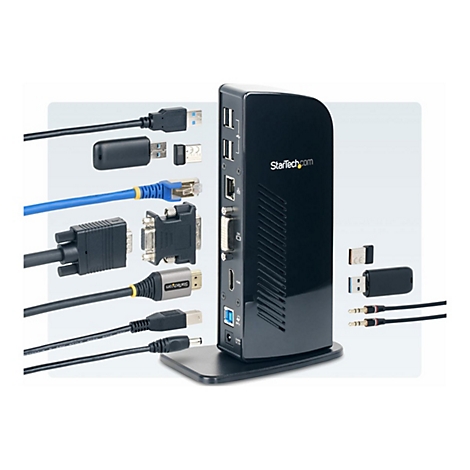 Station d'accueil noire avec divers cÃ¢bles et connecteurs comme USB, HDMI et LAN. Logo : StarTech.com.