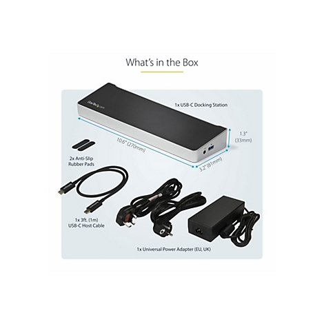 Vue dÃ©taillÃ©e du contenu d'un pack de station d'accueil USB-C, comprenant la station, les cÃ¢bles, l'adaptateur secteur et les patins en caoutchouc. Les Ã©tiquettes sont visibles.