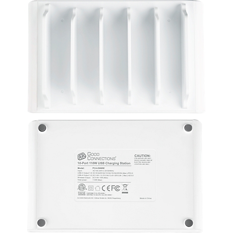 Chargeur blanc avec plusieurs compartiments et des impressions au bas. Haut: compartiments pour appareils. Bas: impressions, texte.