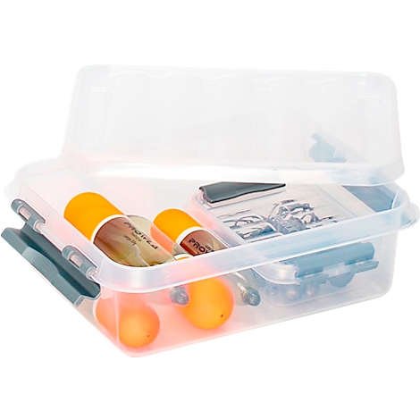 Transparent plastic box, half open, with contents: bottles, balls, and a sheet of paper.