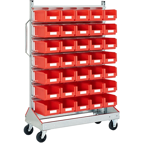 Red cart with drawers. Many red drawers are mounted in a metal frame, including rollers for mobility.