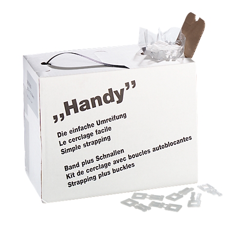 White box labeled "Handy" containing strapping bands and buckles. Open on top with handle. Buckles lie next to it.