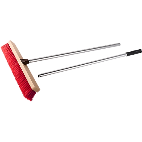 Broom with red bristle head and silver handle, black grip.