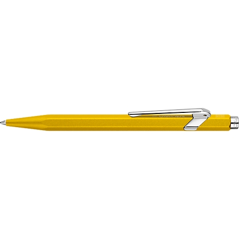 Stylo à bille jaune avec clip argenté.