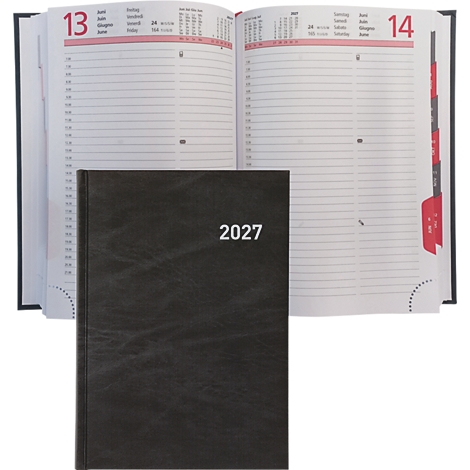 Schwarzes Notizbuch mit der Prägung 2027 liegt vor einem offenen Kalender. Der Kalender hat rot markierte Tage.