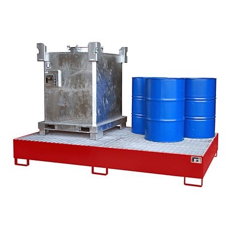 A metallic container and blue barrels stand on a red platform with grating.