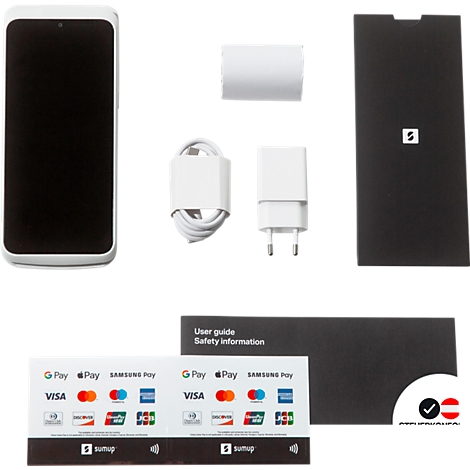 SumUp Kartenterminal mit Zubehör, Ladekabel, Netzstecker, Thermopapier, Aufklebern und Kurzanleitung auf weißem Grund.