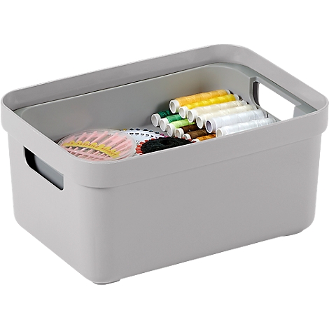 Gray storage box filled with sewing supplies: spools of thread, needles, and buttons.