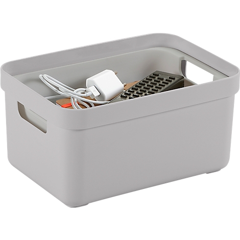Grey storage box with items such as charging cables and remote control.