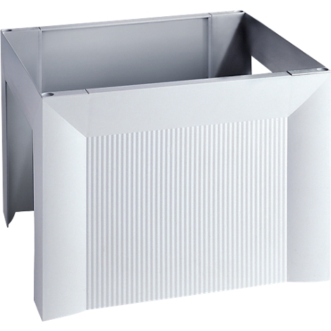 White, rectangular base with a grooved front. The corners are beveled on the sides, providing a stable base.