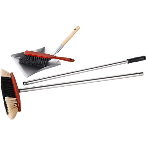 Broom, hand brush and dustpan on white background. The broom has red and light bristles. Hand brush and dustpan are red and silver.