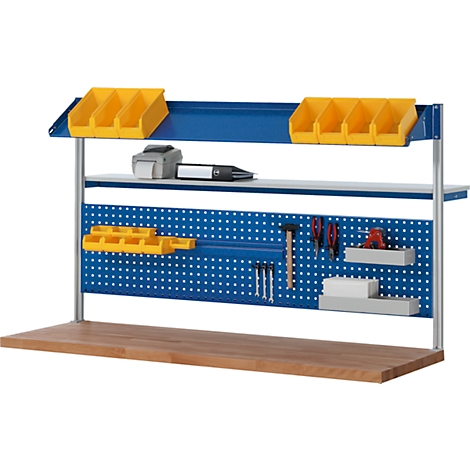 Workbench with blue pegboard, tools and yellow containers.