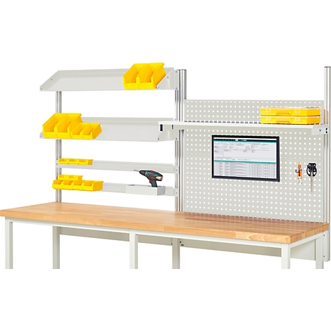 Établi avec outils et accessoires. Conteneurs jaunes, perceuse et moniteur.