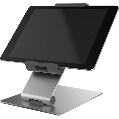 A grey metal tablet stand with a tablet placed on it.