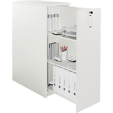 White, open cabinet filled with folders, pens and office supplies. Opened, it reveals practical office organization.