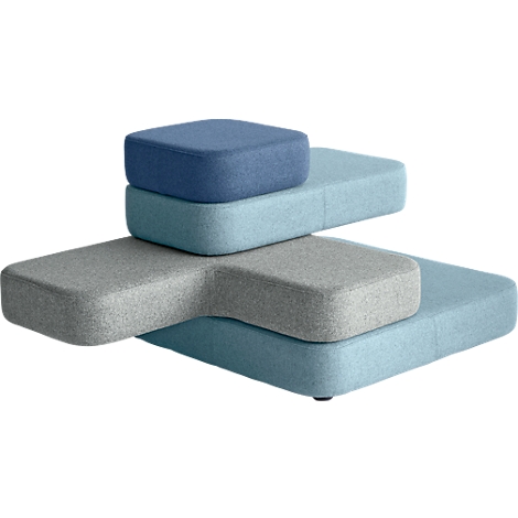 Multicoloured modular seating. Various shapes and shades of blue, grey and turquoise, stacked.