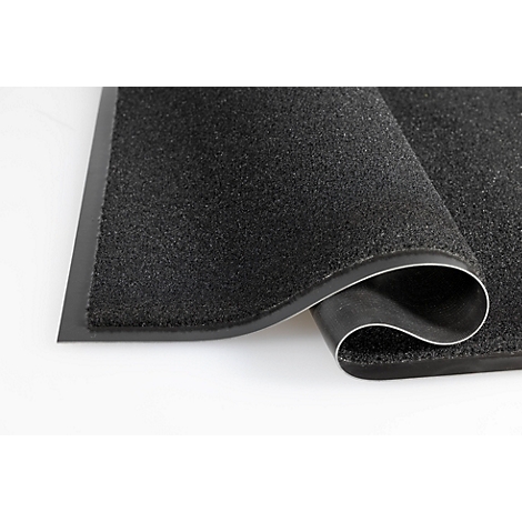 Un tapis d'entrée textile noir avec un dos en caoutchouc flexible sur fond blanc.