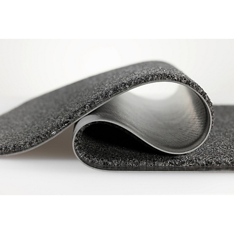 Un revêtement de sol gris et flexible avec une texture, courbé en boucle.
